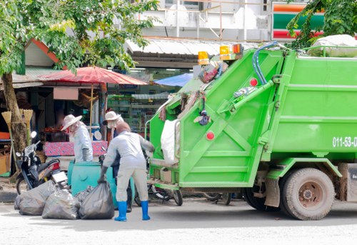 Professional waste management team handling builders waste